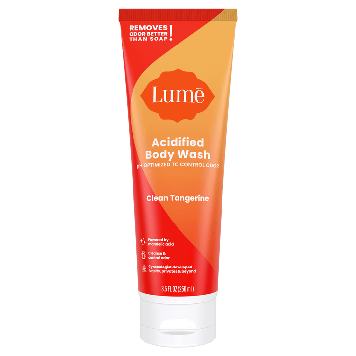 Orange Lume clean tangerine acidified body wash against a white background